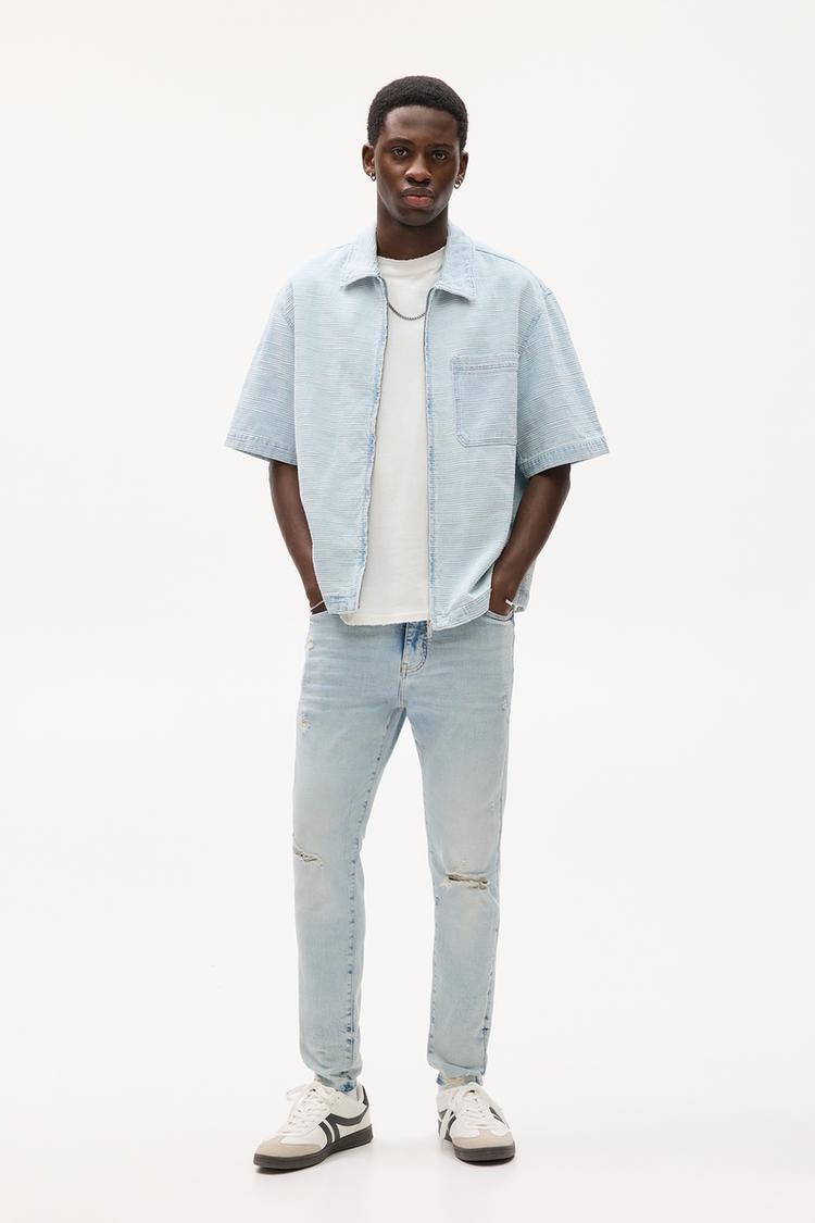 

Джинсы с рваными краями Pull And Bear, голубой
