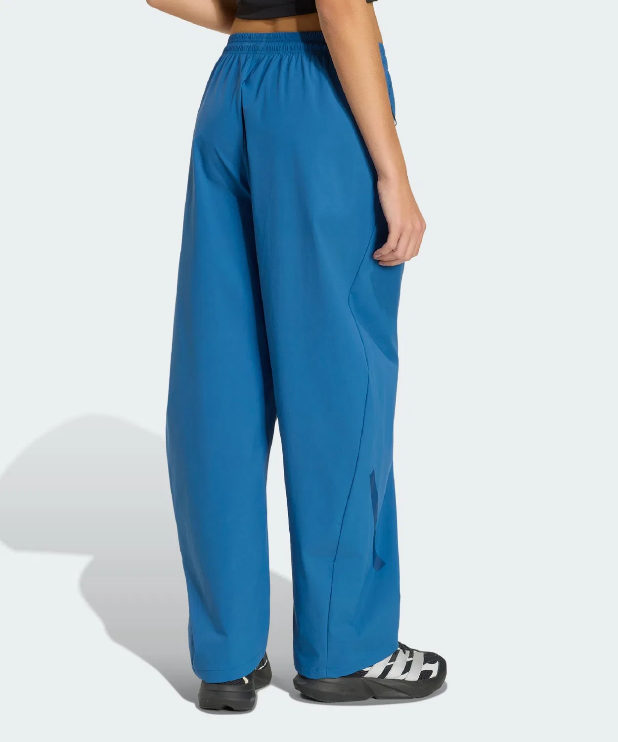 Женские спортивные брюки свободного кроя с рипстоп-тканью Adidas Z.N.E. Woven Pants, Blue — фото 2