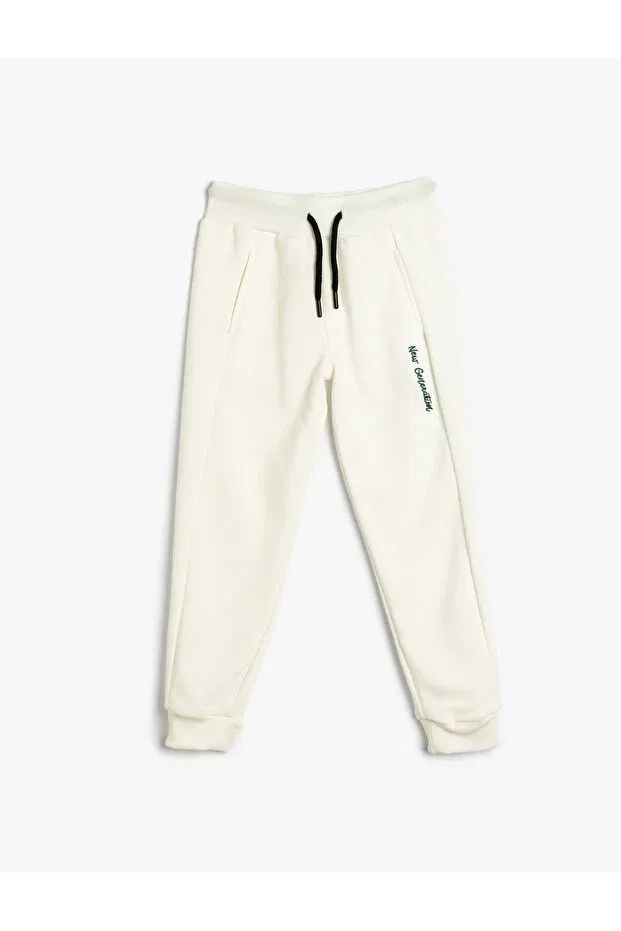 Детские спортивные штаны для мальчиков с принтом Slogan printed tie waist jogger sweatpants Koton, Ecru
