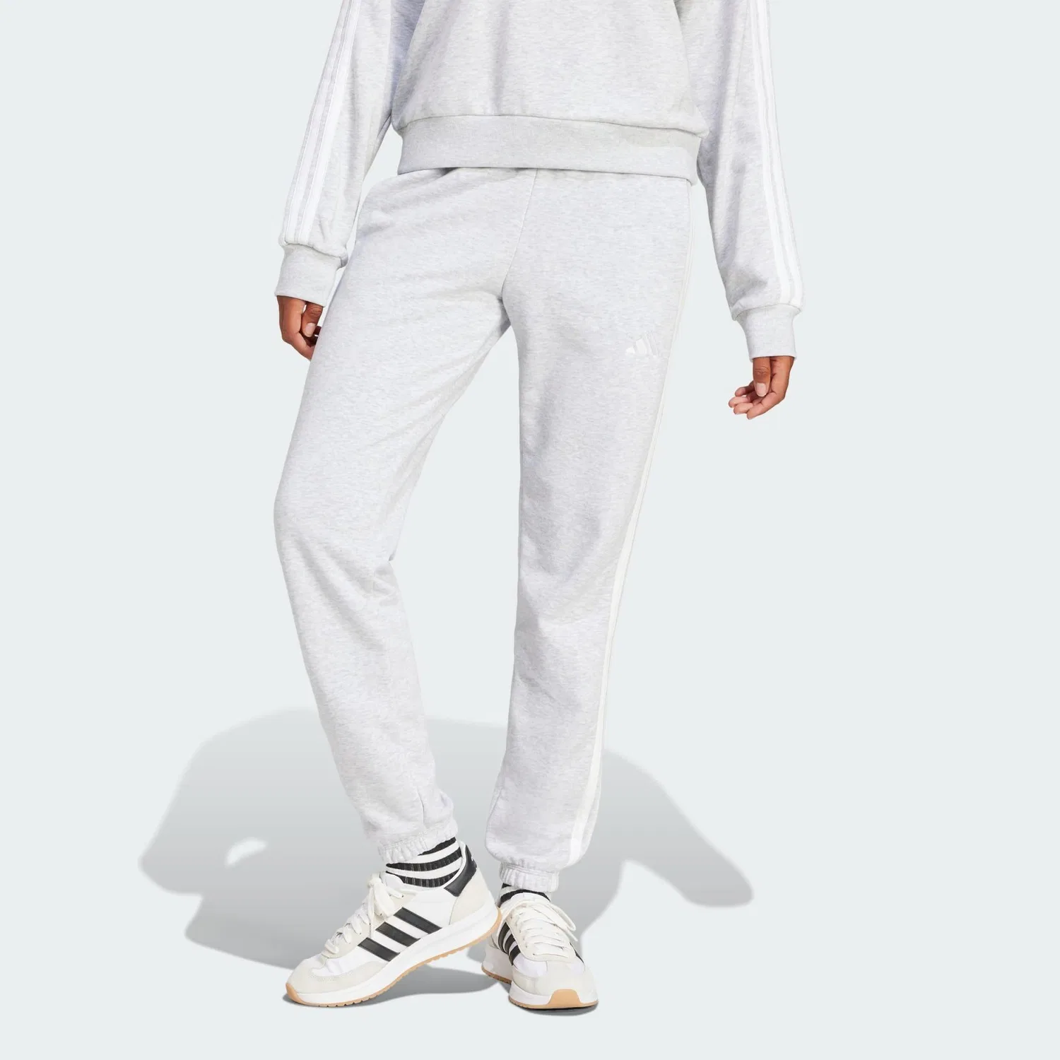 Женские спортивные штаны из футера Essentials 3-Streifen French Terry Cuffed Hose Adidas, Hellgrau Weiss