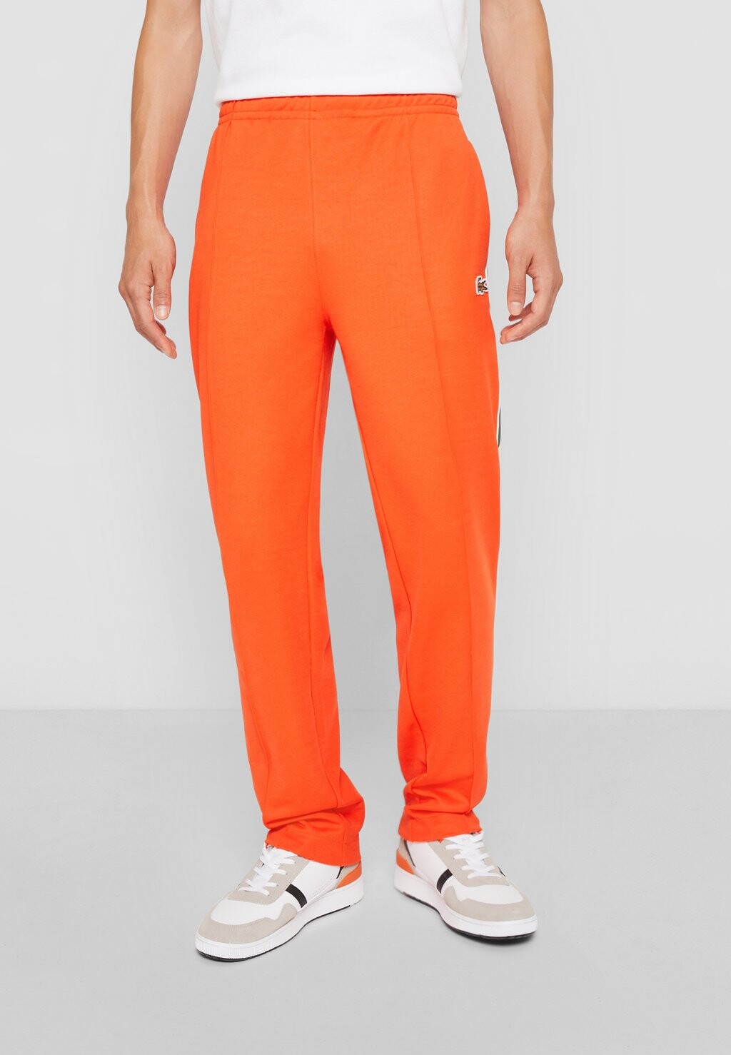 

Спортивные брюки Exclusive Lacoste, цвет sunrise