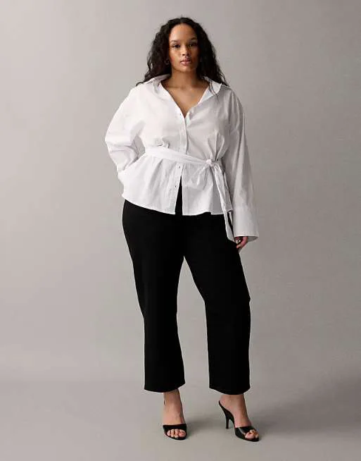 

Черные удобные эластичные прямые джинсы с защипами до щиколотки ASOS DESIGN Curve