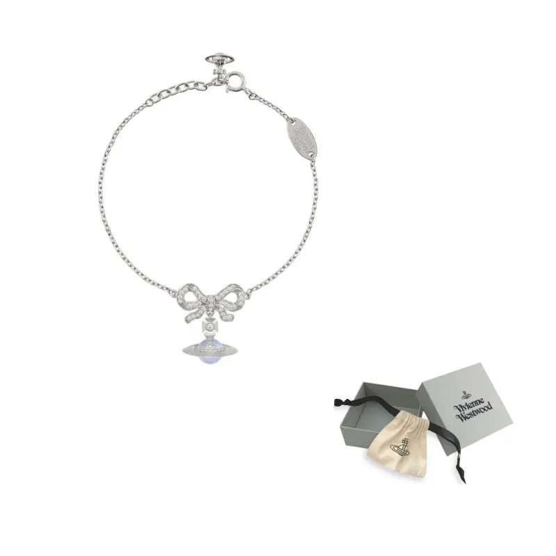 

Vivienne Westwood Браслет с подвеской в виде шара Сатурна с бантом из латуни, цвет silver/blue
