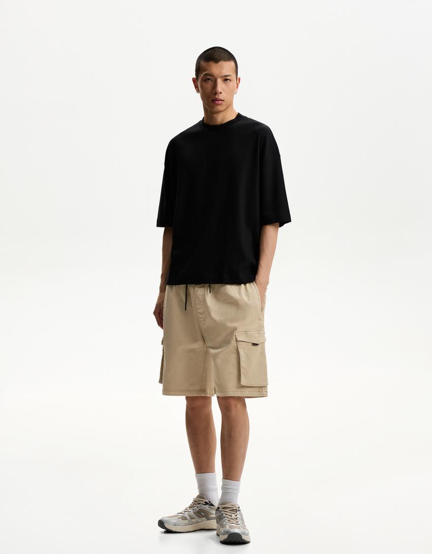 

Спортивные брюки-бермуды Cargo Bershka, желтый