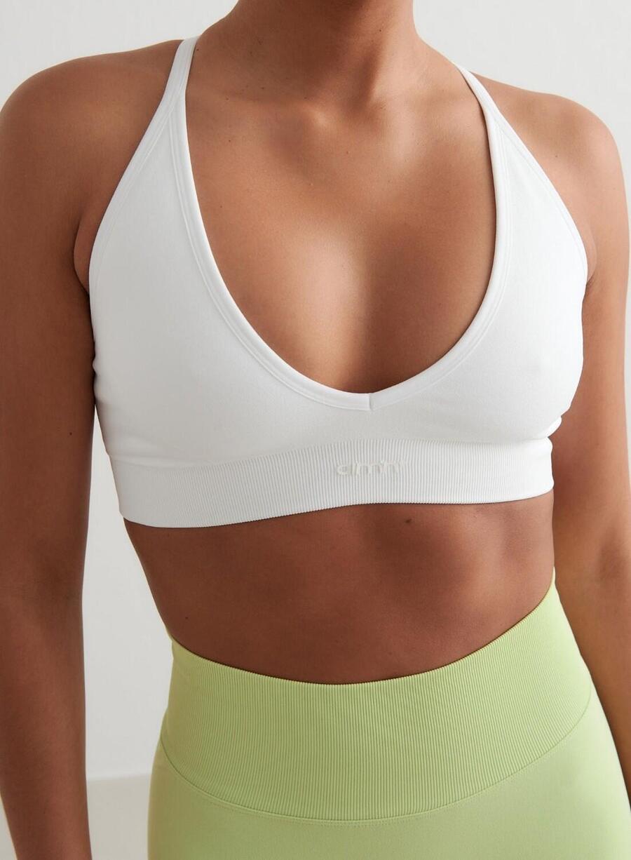 

AIM'N Женский спортивный бюстгальтер для йоги, бесшовный, с перекрещивающимися бретелями на спине и глубоким вырезом, белый