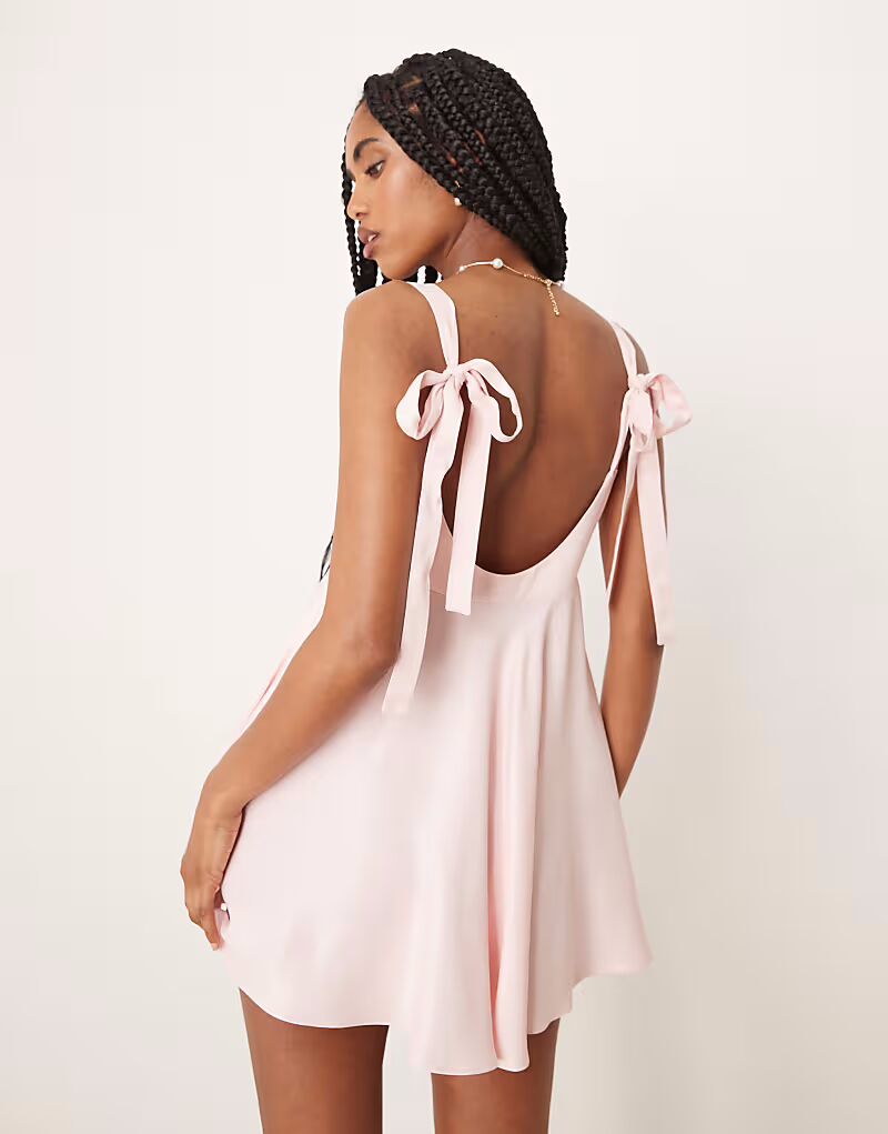 

Платье мини-платье ASOS DESIGN с атласным бантом сзади розового цвета