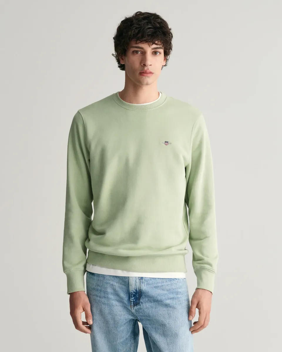 

Толстовка Gant "REG SHIELD C-NECK SWEAT" с вышитым логотипом на груди, цвет Milky Matcha