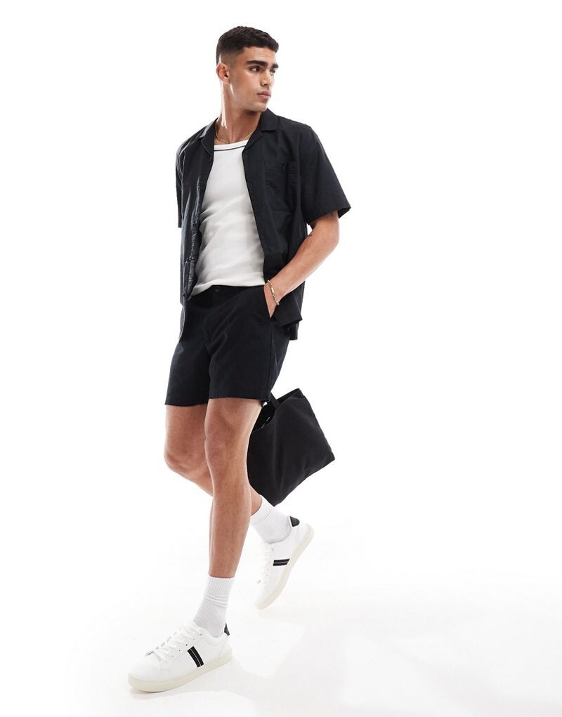 

Черные широкие льняные шорты ASOS DESIGN