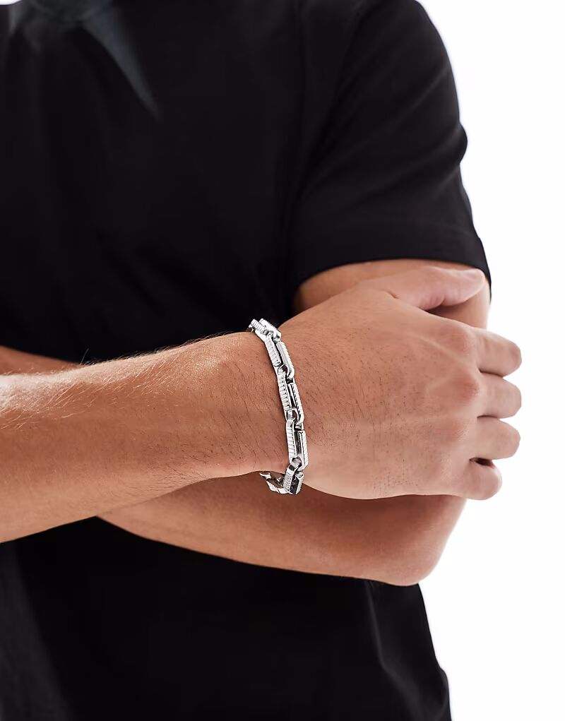 

Массивный водонепроницаемый браслет Festival из нержавеющей стали с тиснеными деталями серебристого цвета Asos Design