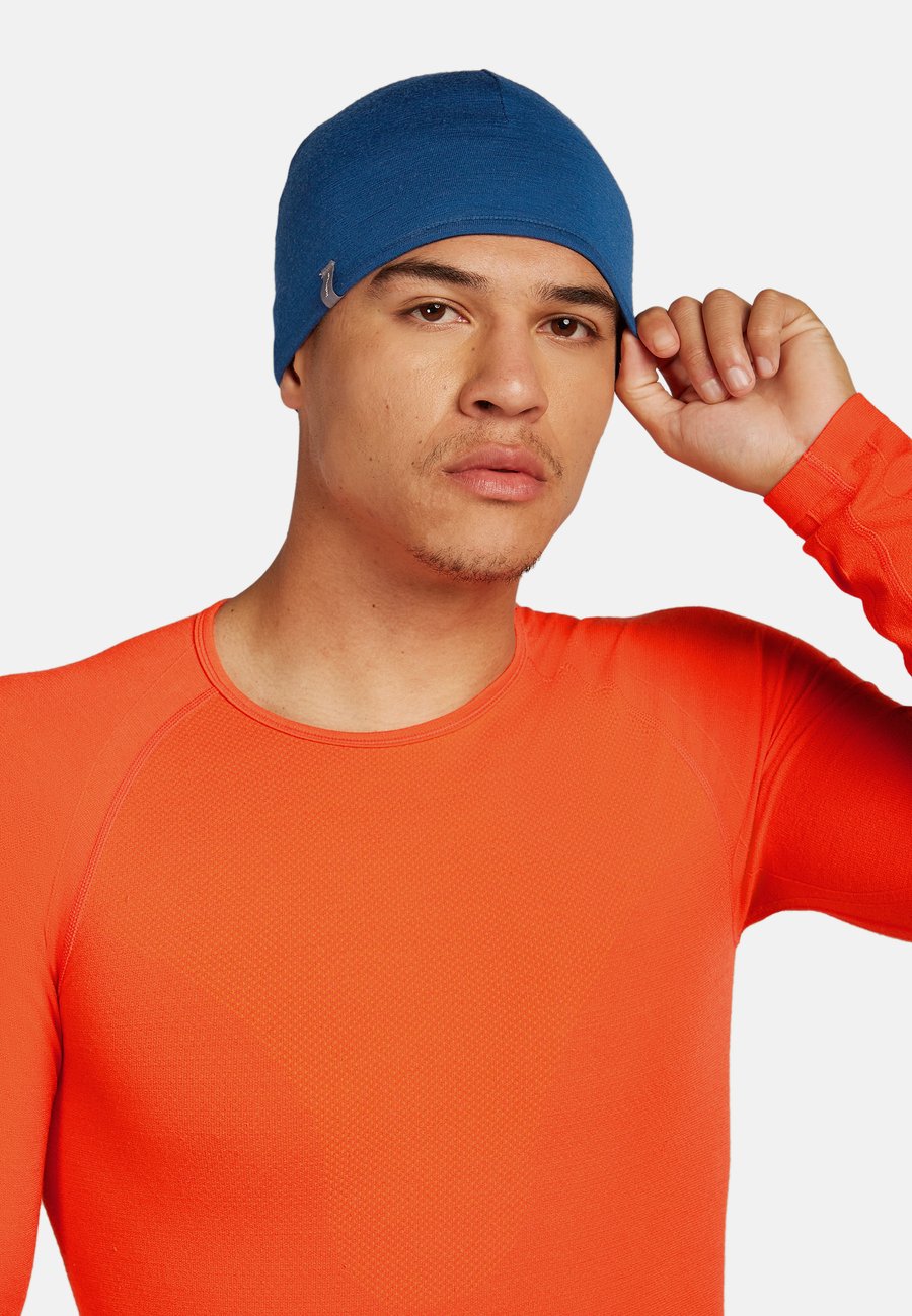 

Шапка icebreaker REVERS, Java Atlantis/Dark Blue