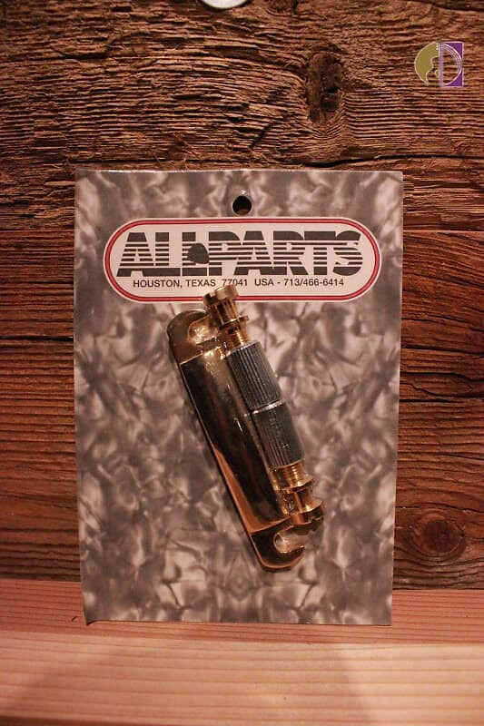 

Все детали TP-0400-002 Наконечник стопорной планки US — золото Allparts TP 0400-002