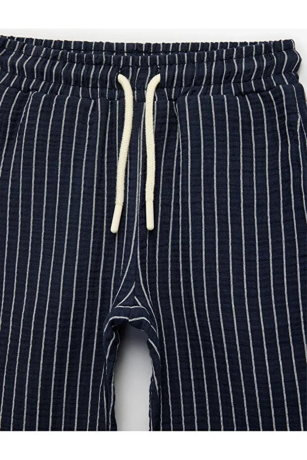 Детские брюки для девочек хлопковые с принтом Koton, Navy Blue Striped — фото 3