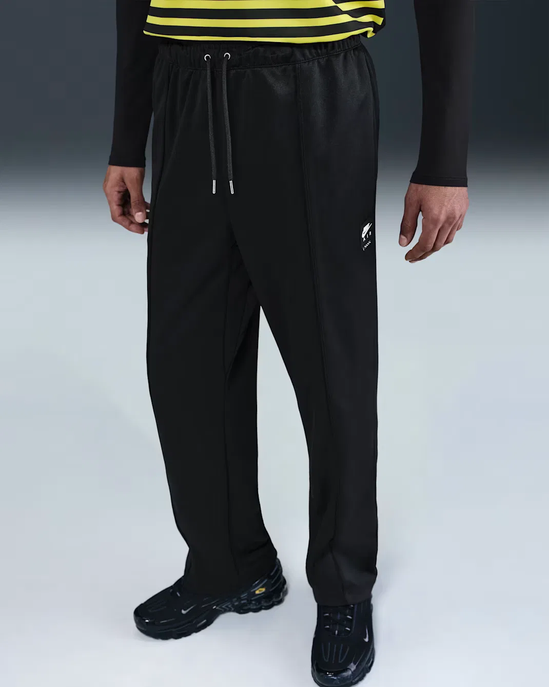 Мужские спортивные брюки из полиэстерового трикотажа Nike Sportswear Air, Black/Black — фото 2
