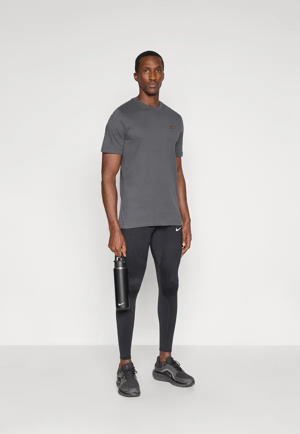 Леггинсы дышащие Stride Nike Performance/Reflective Silver, черный — фото 2