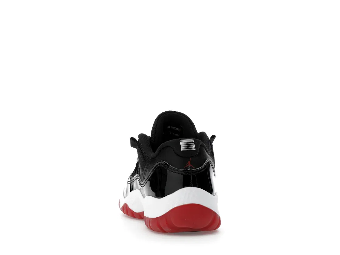 Детские кроссовки баскетбольные с низким верхом Jordan 11 Retro Low, Black/White-Varsity Red — фото 4
