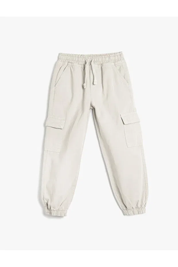 Детские спортивные брюки для мальчиков хлопковые Cotton jogger trousers with lace-up waist and flap pocket detail Koton, Stone — фото 3