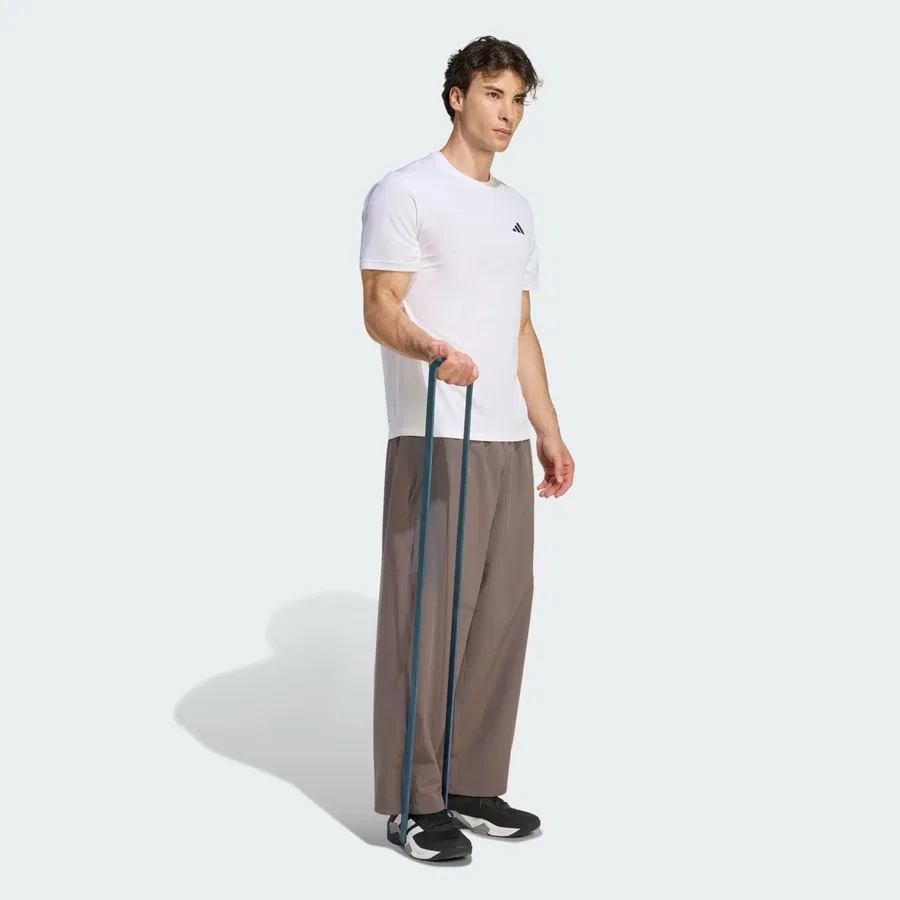 Спортивные брюки oversize с карманами, модель Primelift, adidas, Коричневый — фото 3