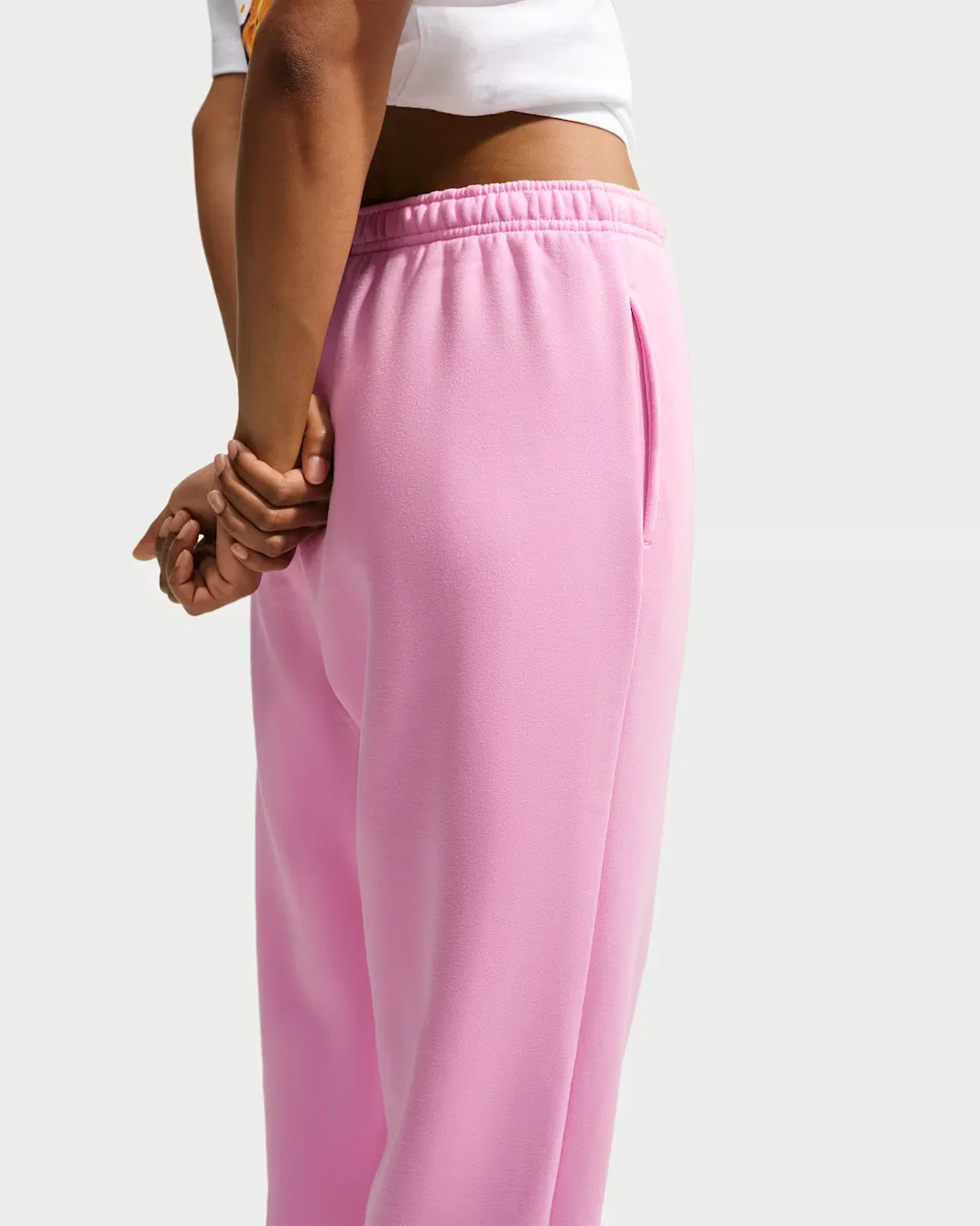 Женские брюки с высокой посадкой, свободного кроя и манжетами Nike Studio Fleece Medium Weight, Pink Rise/Sail — фото 3