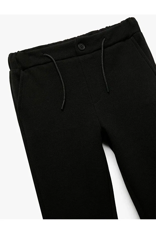 Детские спортивные штаны для мальчиков с утяжкой на поясе Koton, Black — фото 3