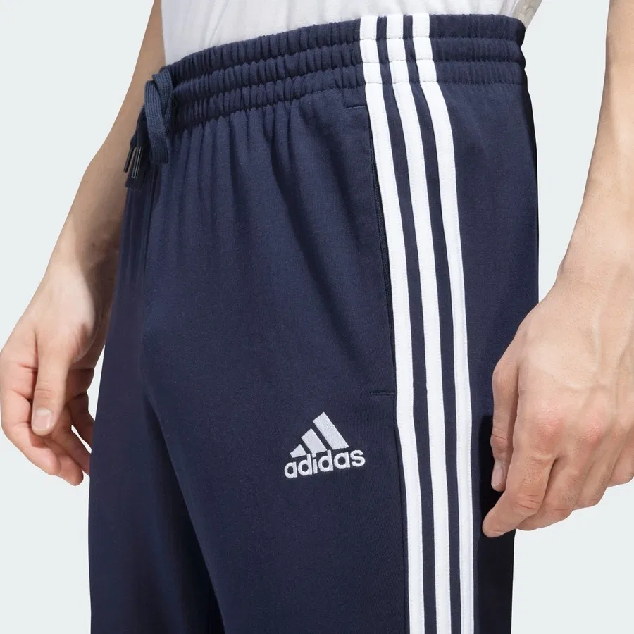 Спортивные штаны с тремя полосками Essentials Single Jersey Tapered Open Hem 3-Stripes Pants adidas, Сине-белый — фото 4