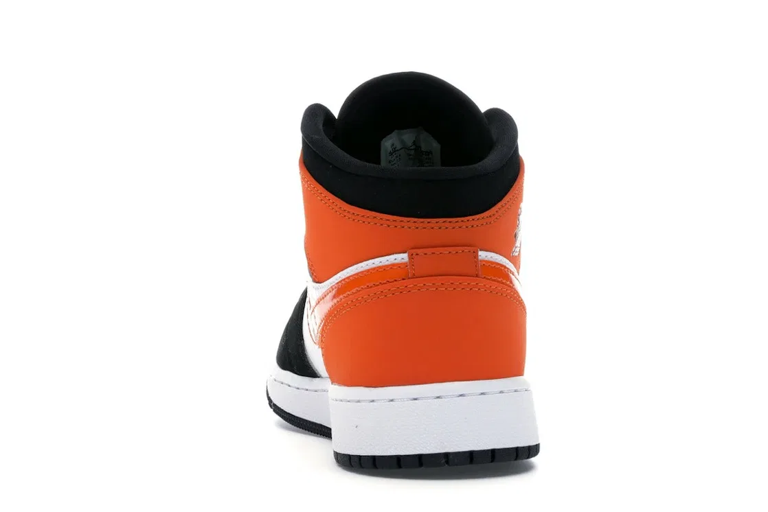 Детские кроссовки для мальчиков с кожаным верхом Jordan 1 Mid, Black/Starfish-Starfish-White — фото 4