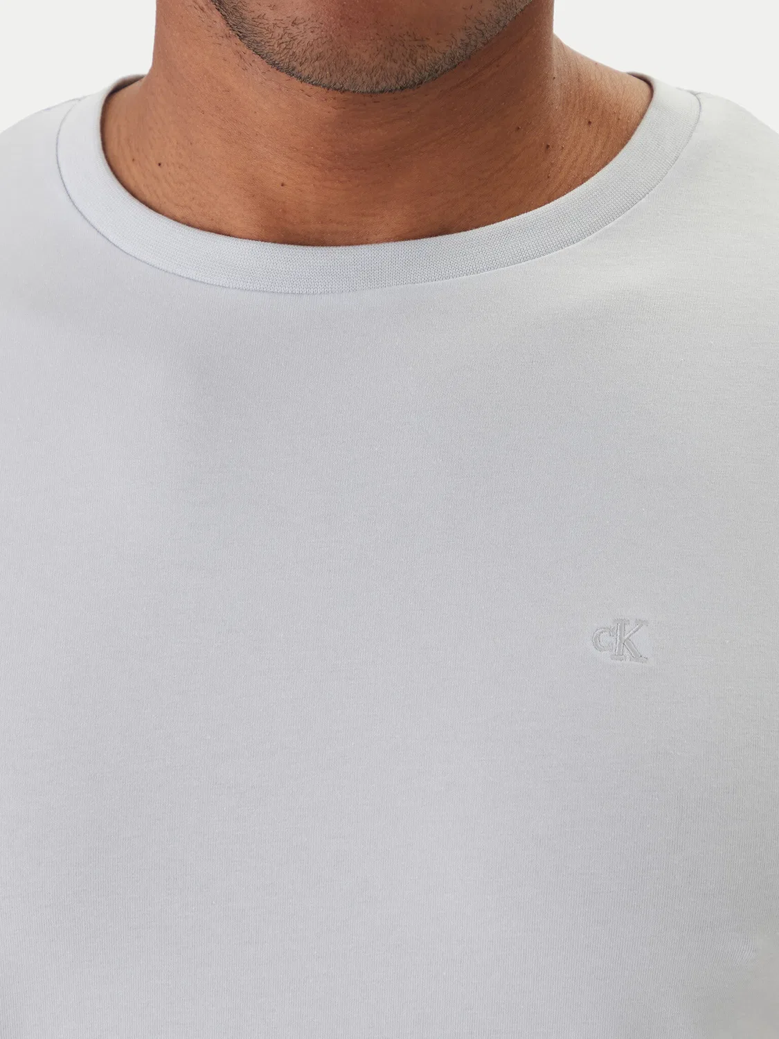 Мужская футболка небесно-голубого цвета приталенного кроя Calvin Klein, голубой — фото 4