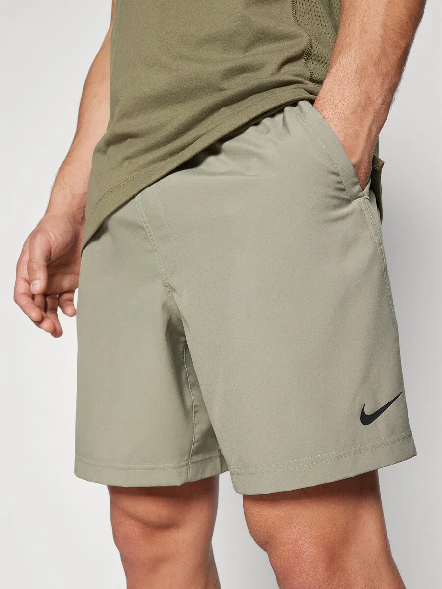 Спортивные брюки NIKE Regular, светло-зеленого цвета — фото 4