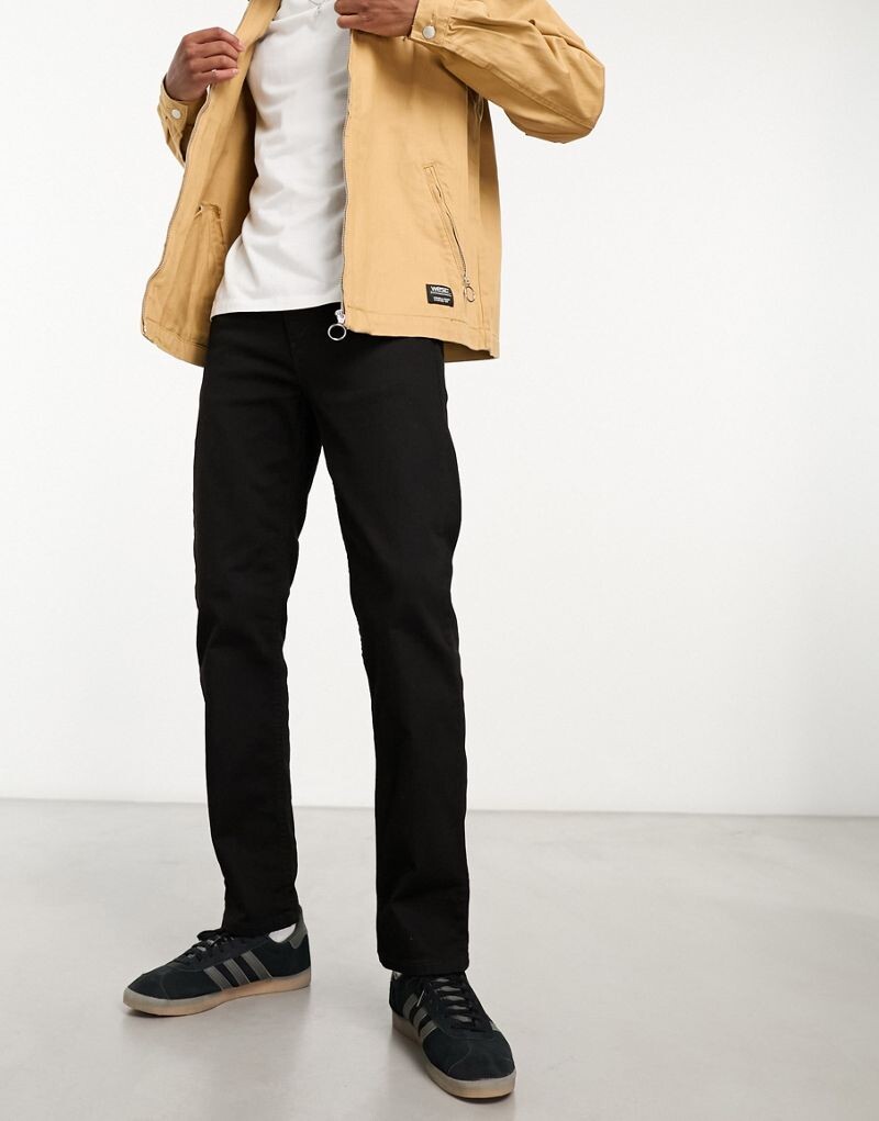 

Черные зауженные джинсы Levi's 502