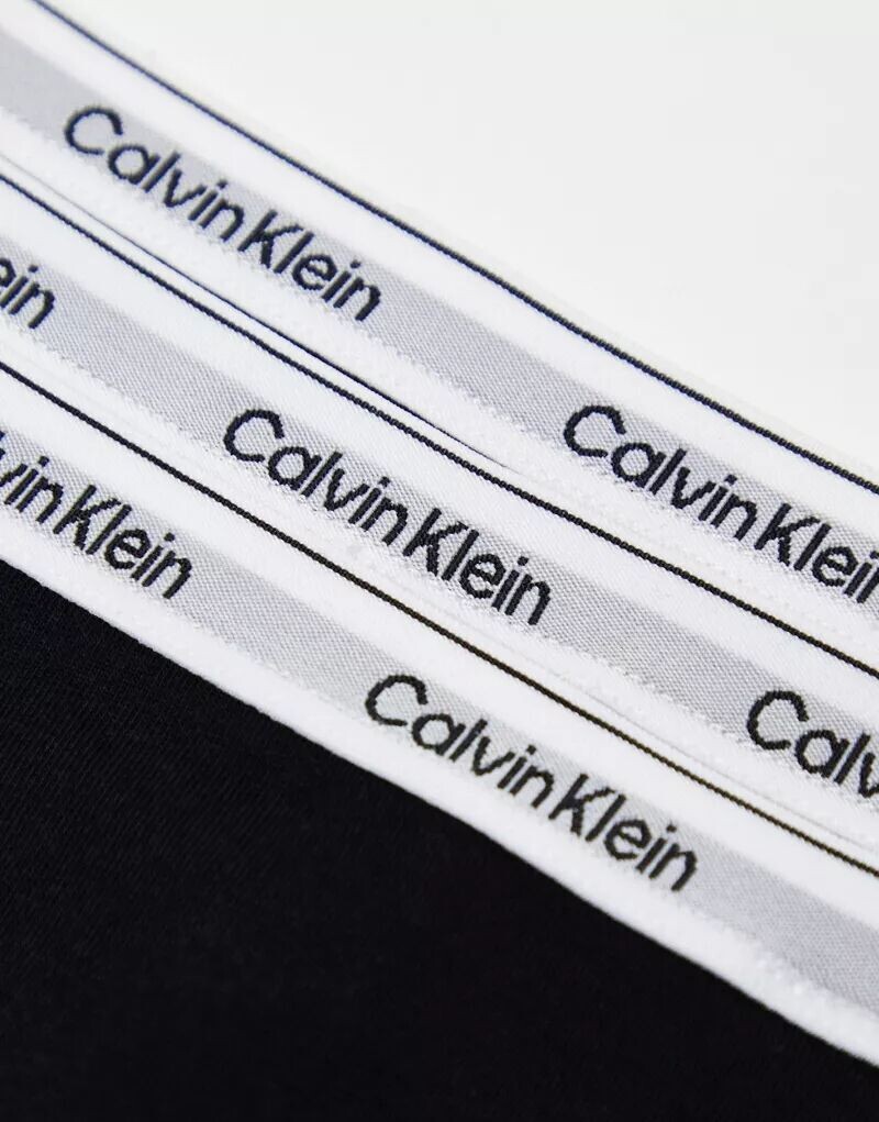 Черные трусы-стринги Calvin Klein Modern Logo (3 шт.) — фото 4