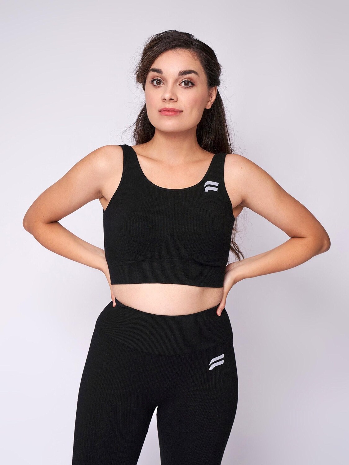 

Fortex Fitness Спортивный бюстгальтер Low Support 'Seamless Essential' в черном цвете