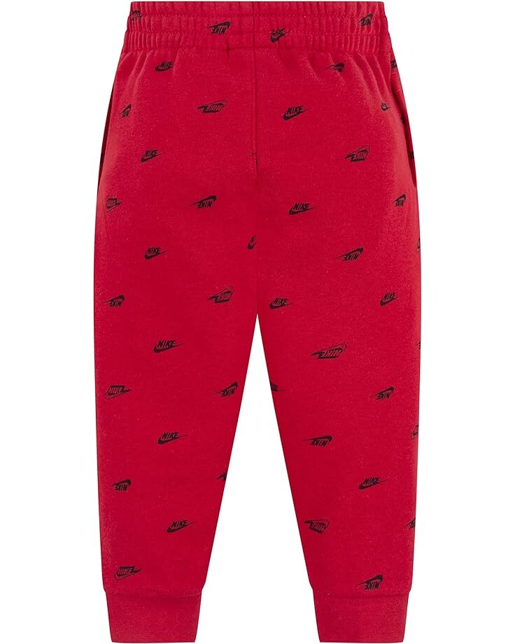 

Брюки Nike NSW Club All Over Print SSNL Pants, цвет Gym Red