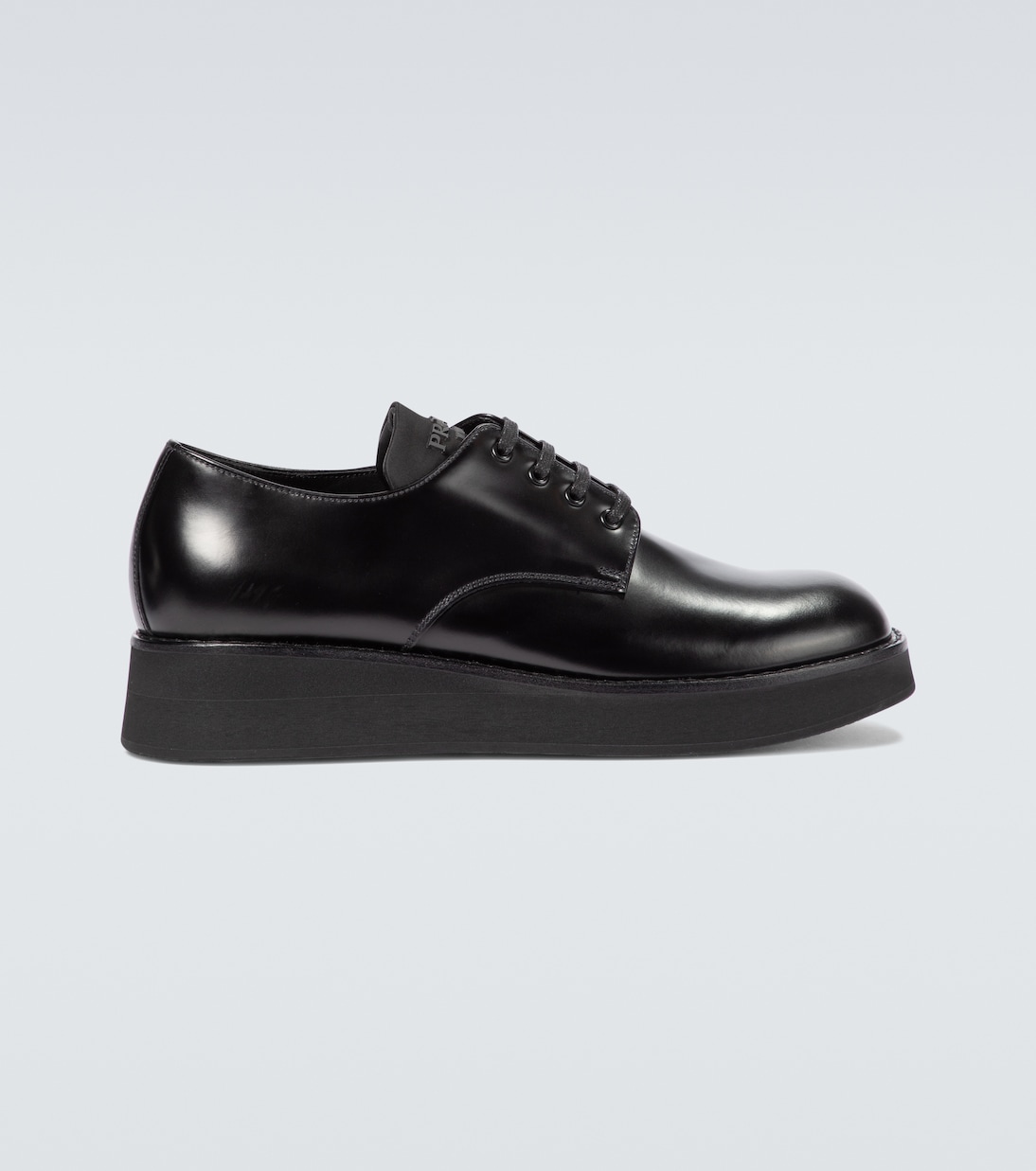 

Кожаные дерби на платформе Prada, черный