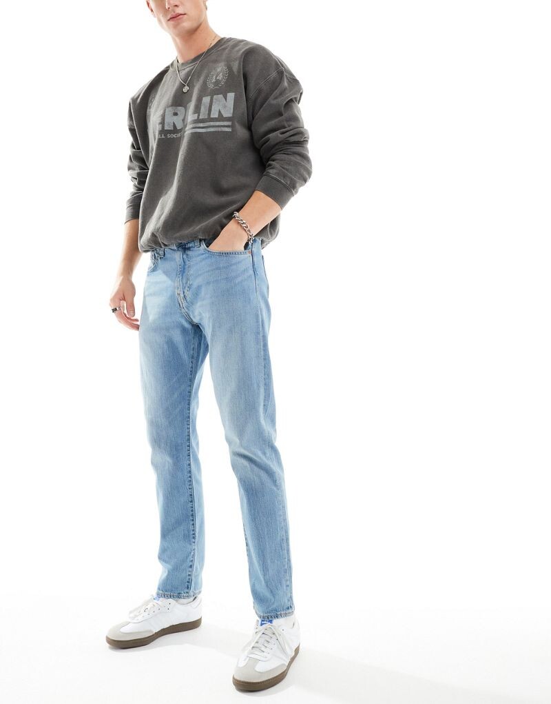 

Levi's – 502 – Голубые джинсы узкого кроя с зауженными штанинами