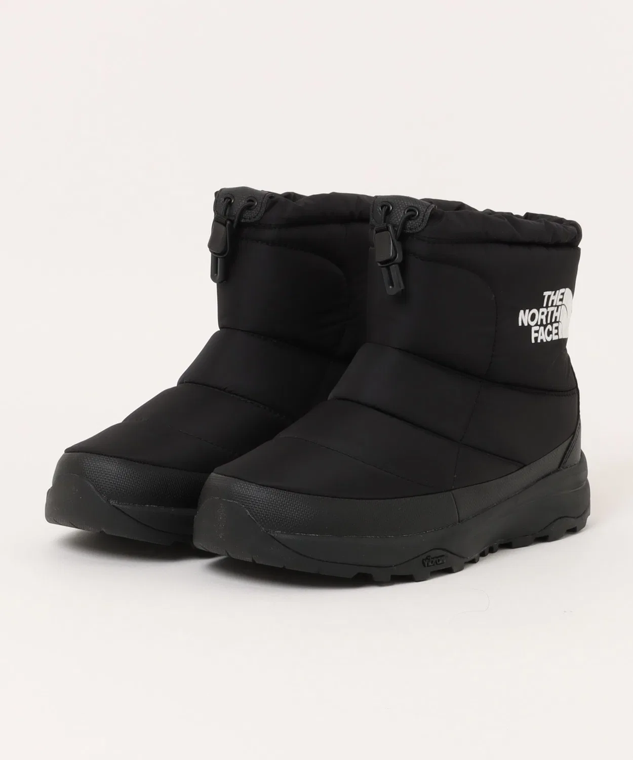 Ботинки зимние The North Face NUPTSE BOOTIE WP LOGO SHORT ARCTIC GRIP, чёрный/белый