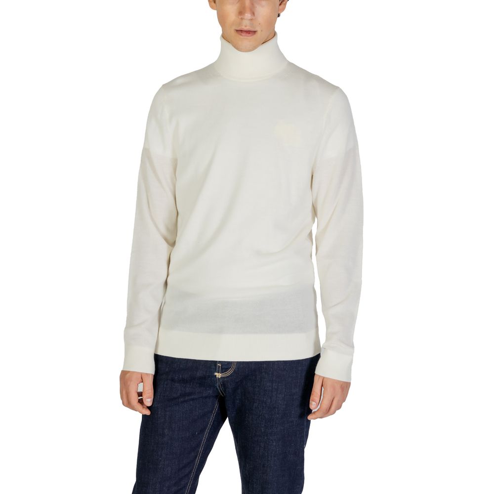 

Кремовый шерстяной свитер Calvin Klein Jeans