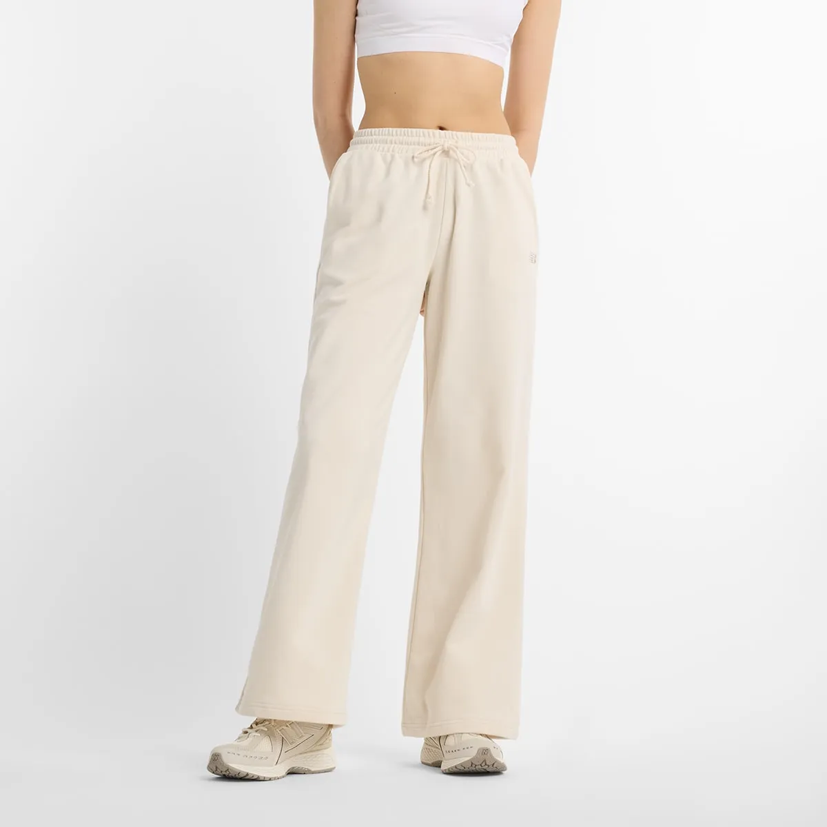 

Женские брюки Coastal Fleece New Balance, бежевый