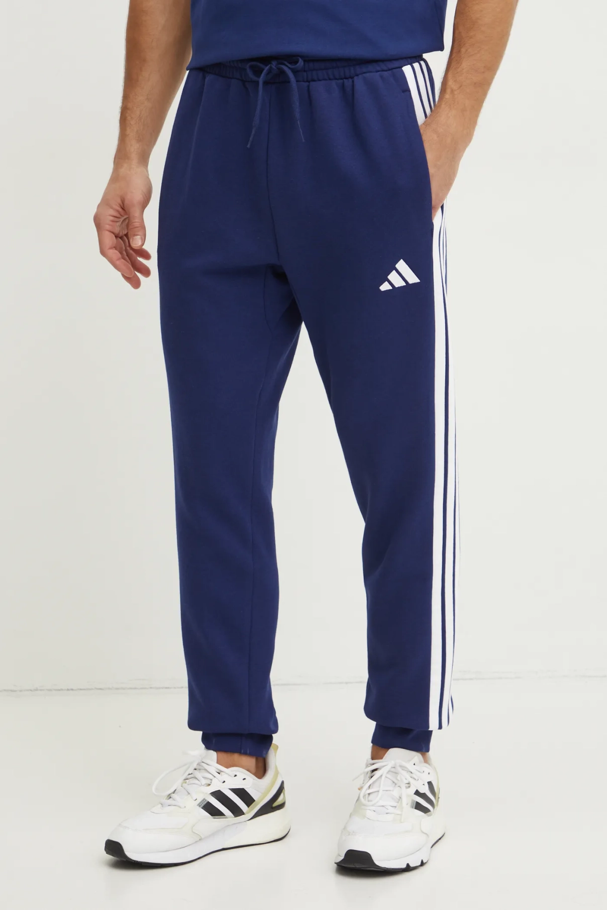 

Спортивные брюки Essentials adidas, темно-синий