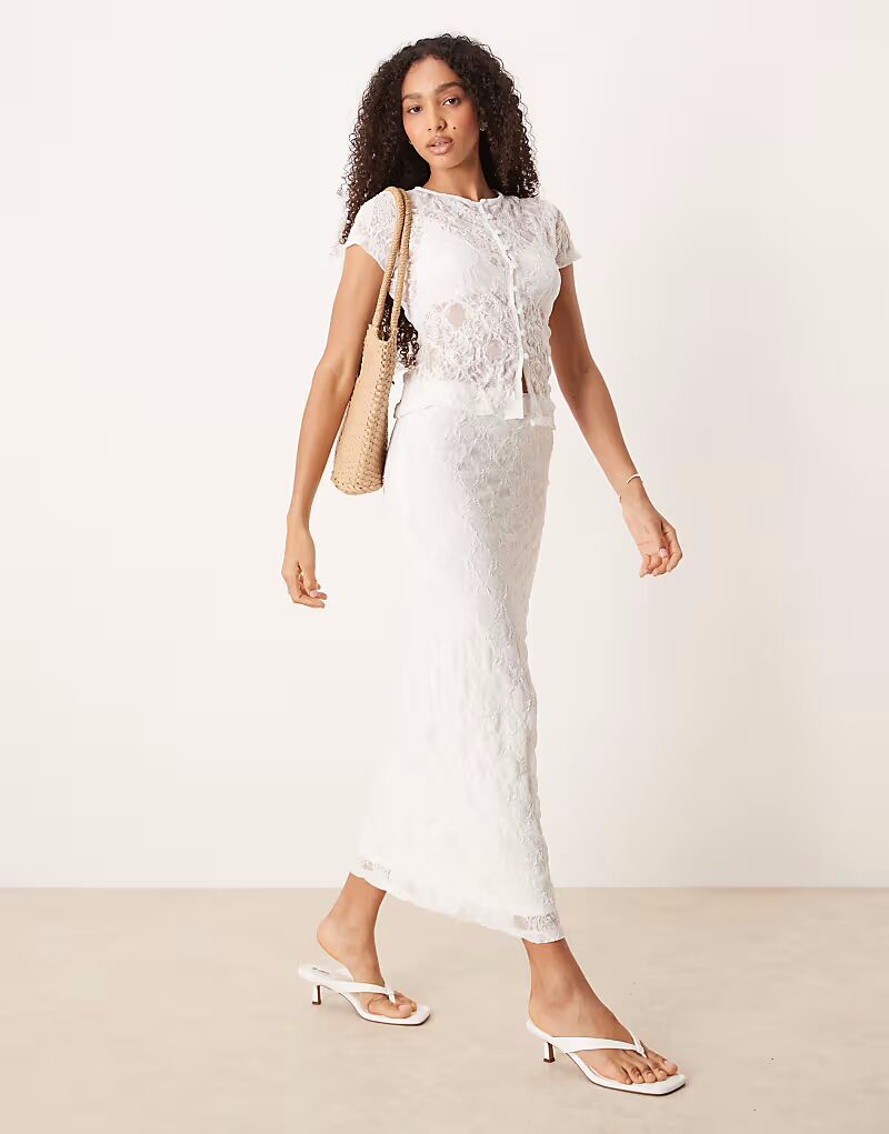 

Юбка миди цвета слоновой кости из прозрачного фактурного кружева Asos Design