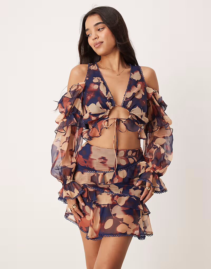 

Топ с длинными рукавами и оборками ASOS DESIGN в цветочном стиле