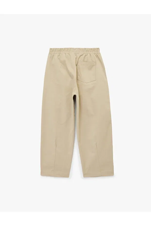Детские брюки для девочек широкие с защипами Pleated cotton oversize gabardine fabric trousers Koton, Beige — фото 4