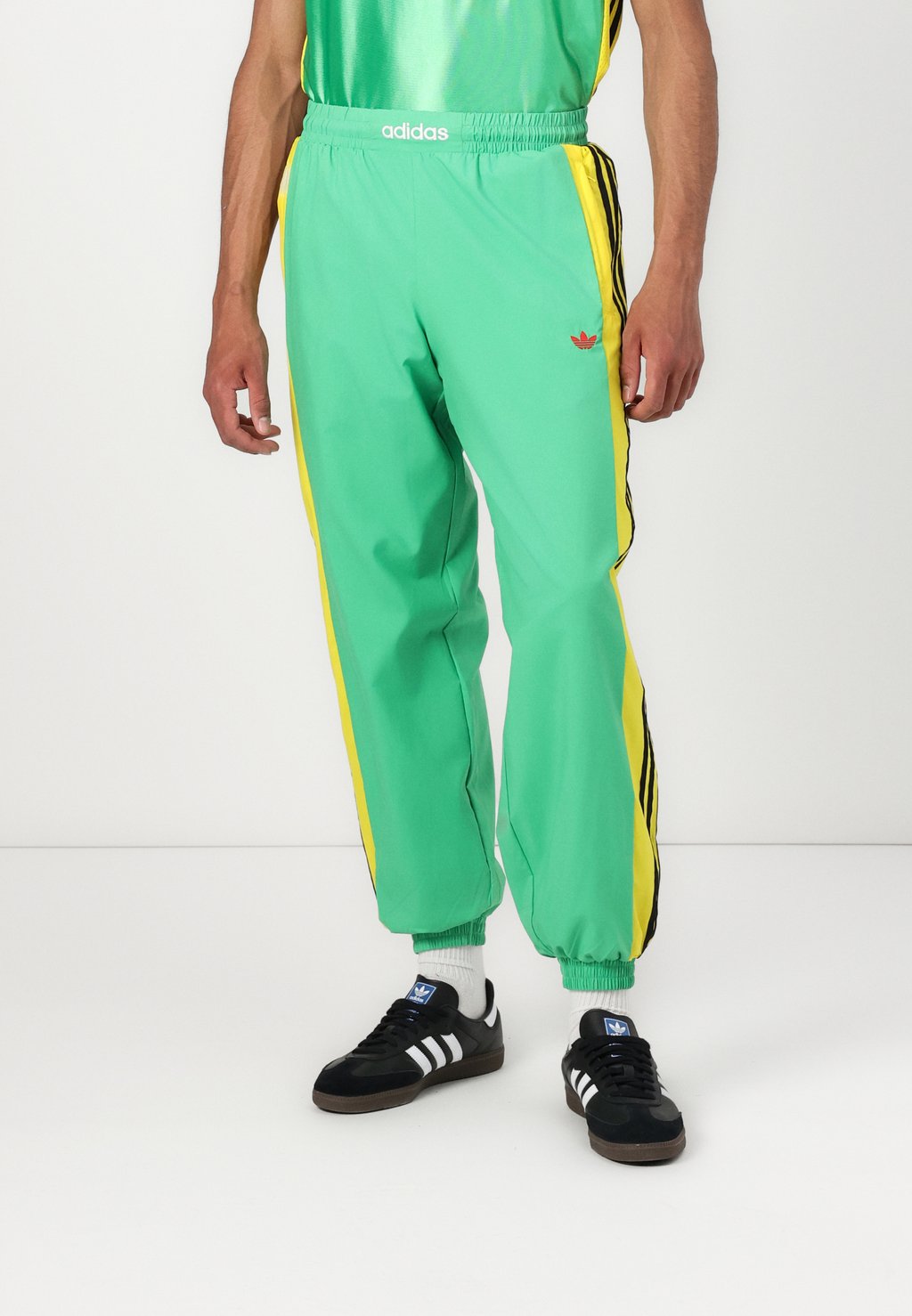

Спортивные штаны WARM UP Adidas Originals, зеленый