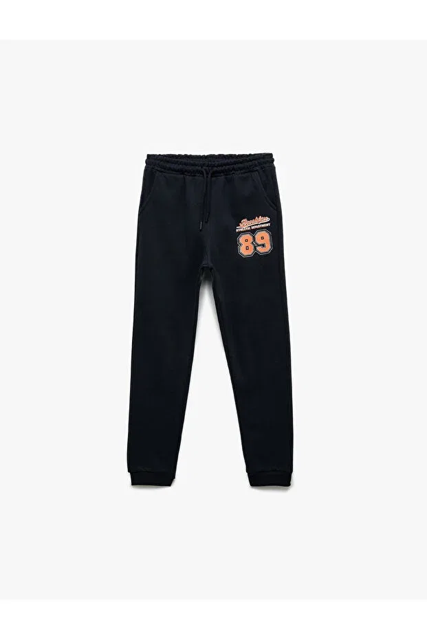 Детские спортивные штаны для мальчиков с принтом Printed detailed pocketed fleece-lined jogger sweatpants Koton, Navy Blue