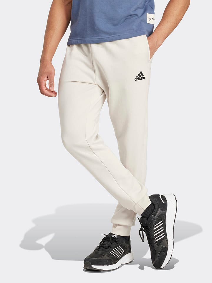 

Спортивные штаны adidas, кремовый