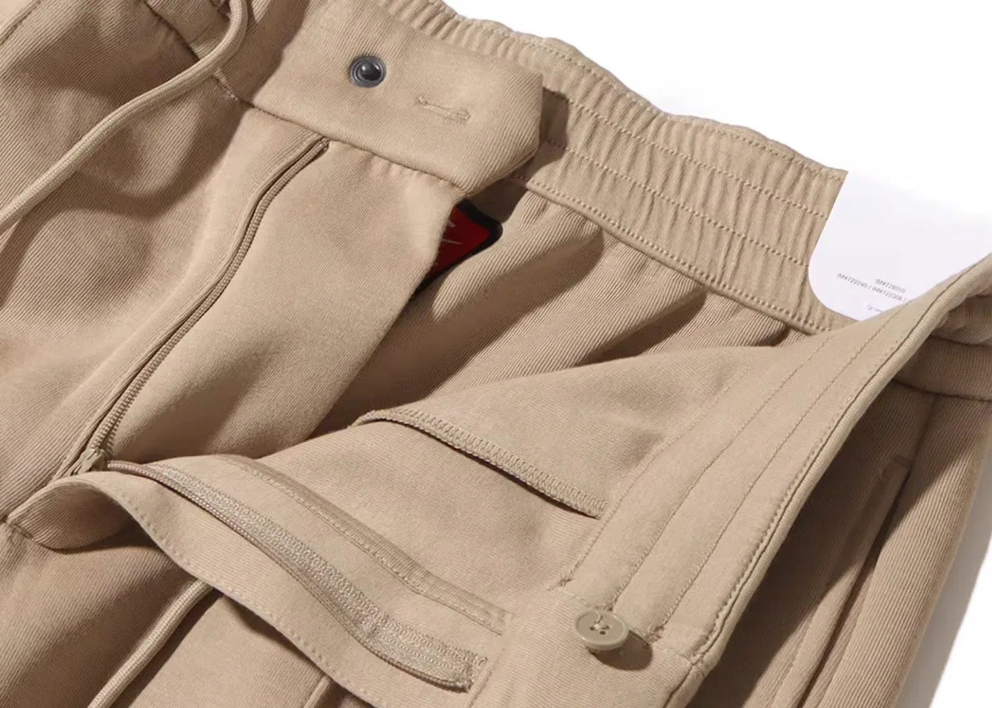 Мужские спортивные брюки с зауженным кроем Nike Sportswear Tech Fleece Reimagined Tailored Sweatpants, Khaki — фото 3