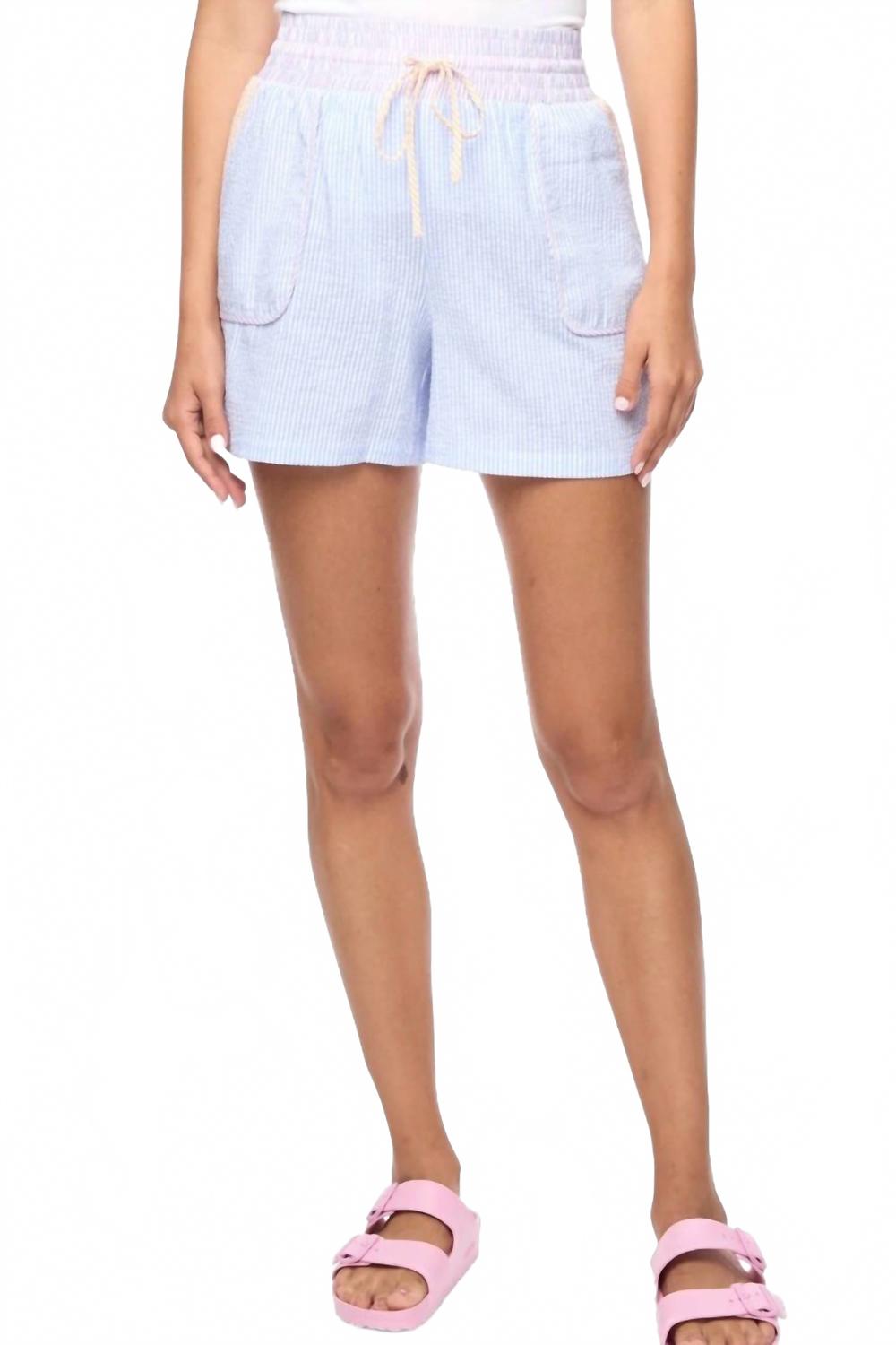 

Брюки-шорты Bailey Seersucker на резинке в сине-фиолетовую полоску Flags & Anthem