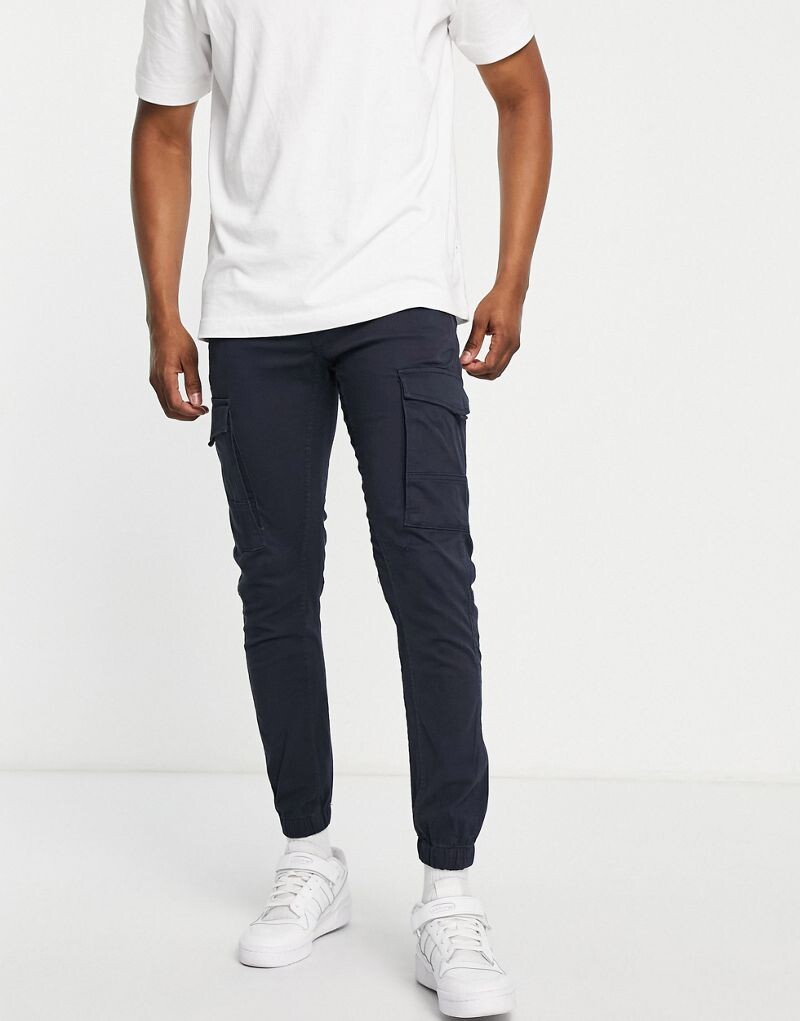 

Темно-синие узкие брюки-карго с манжетами Jack & Jones Intelligence