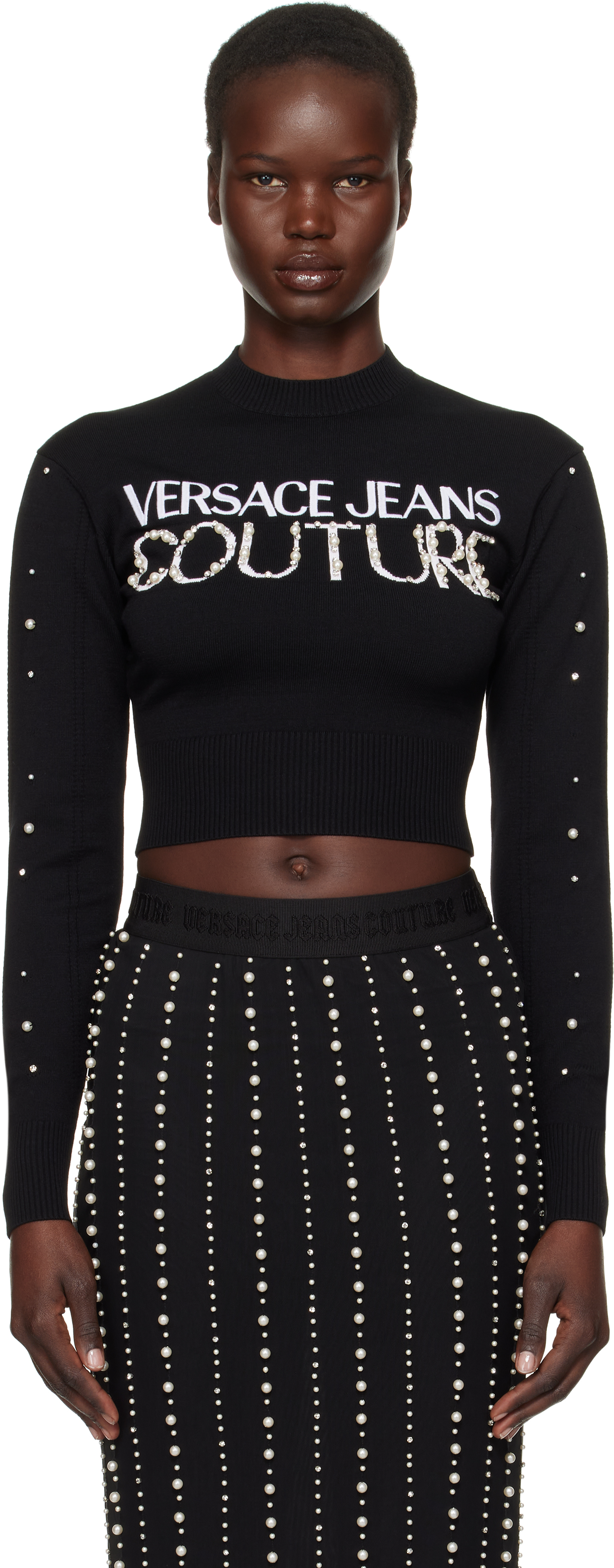 

Черный свитер с декорированным логотипом Versace Jeans Couture