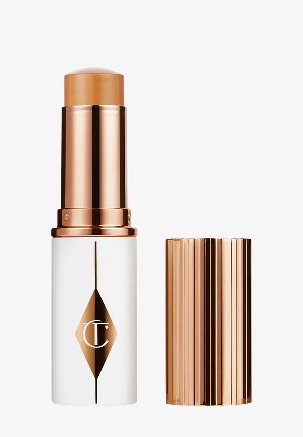 Невероятно сияющая тональная основа для лица Unreal Skin Sheer Glow Tint 9 г Charlotte Tilbury, цвет 9_tan