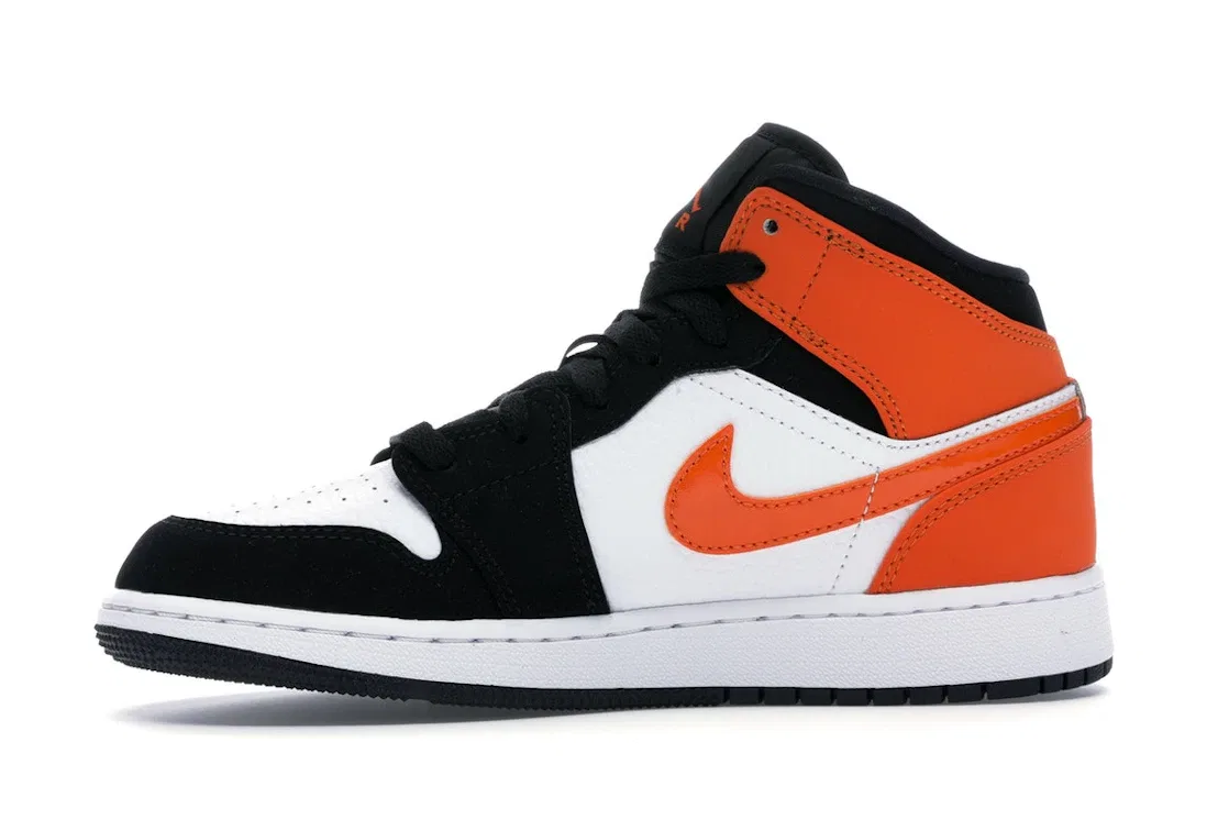 Детские кроссовки для мальчиков с кожаным верхом Jordan 1 Mid, Black/Starfish-Starfish-White — фото 3