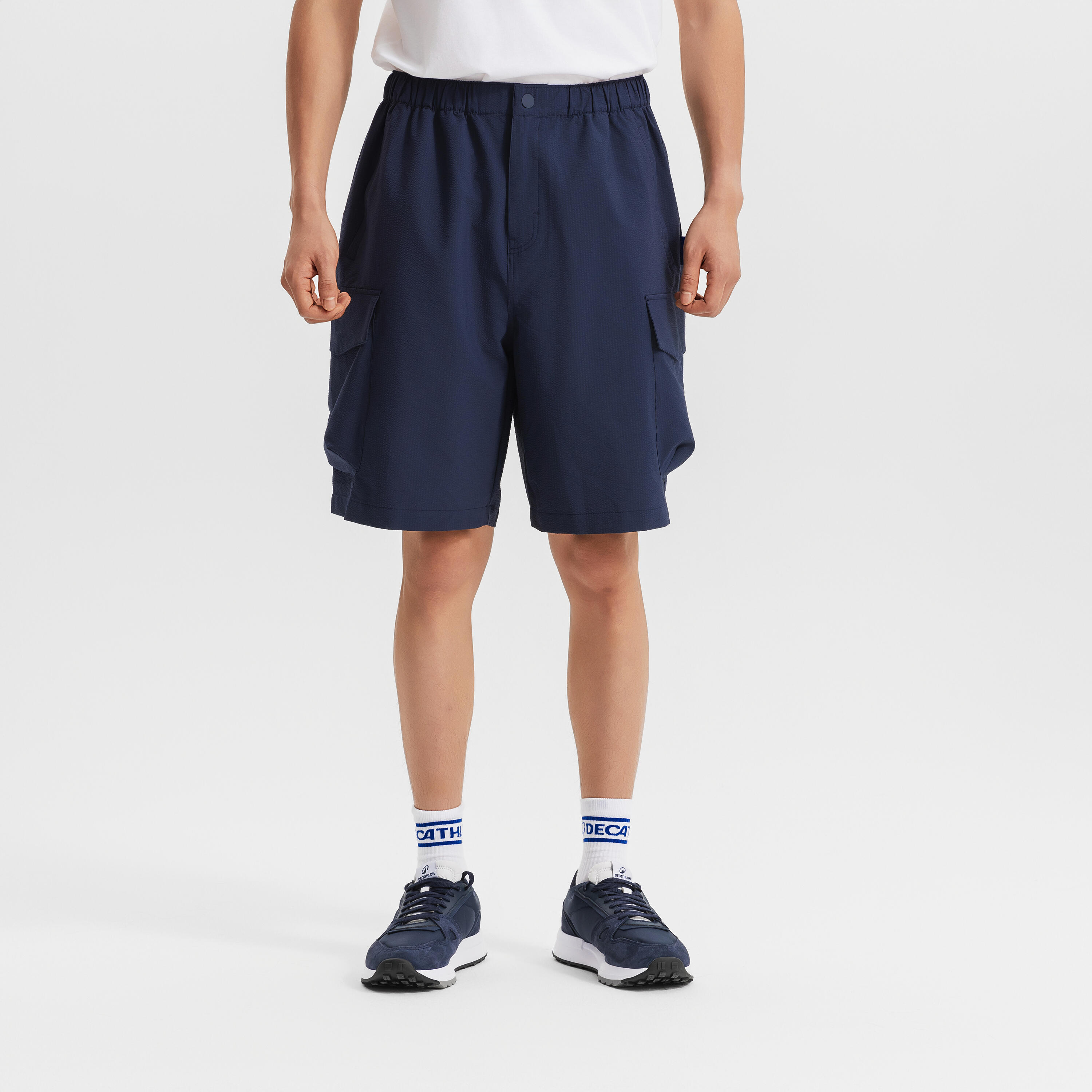 

Мужские спортивные шорты Decathlon SPORTSWEAR городской функционал с отделкой пузырчатой тканью сине-чёрные